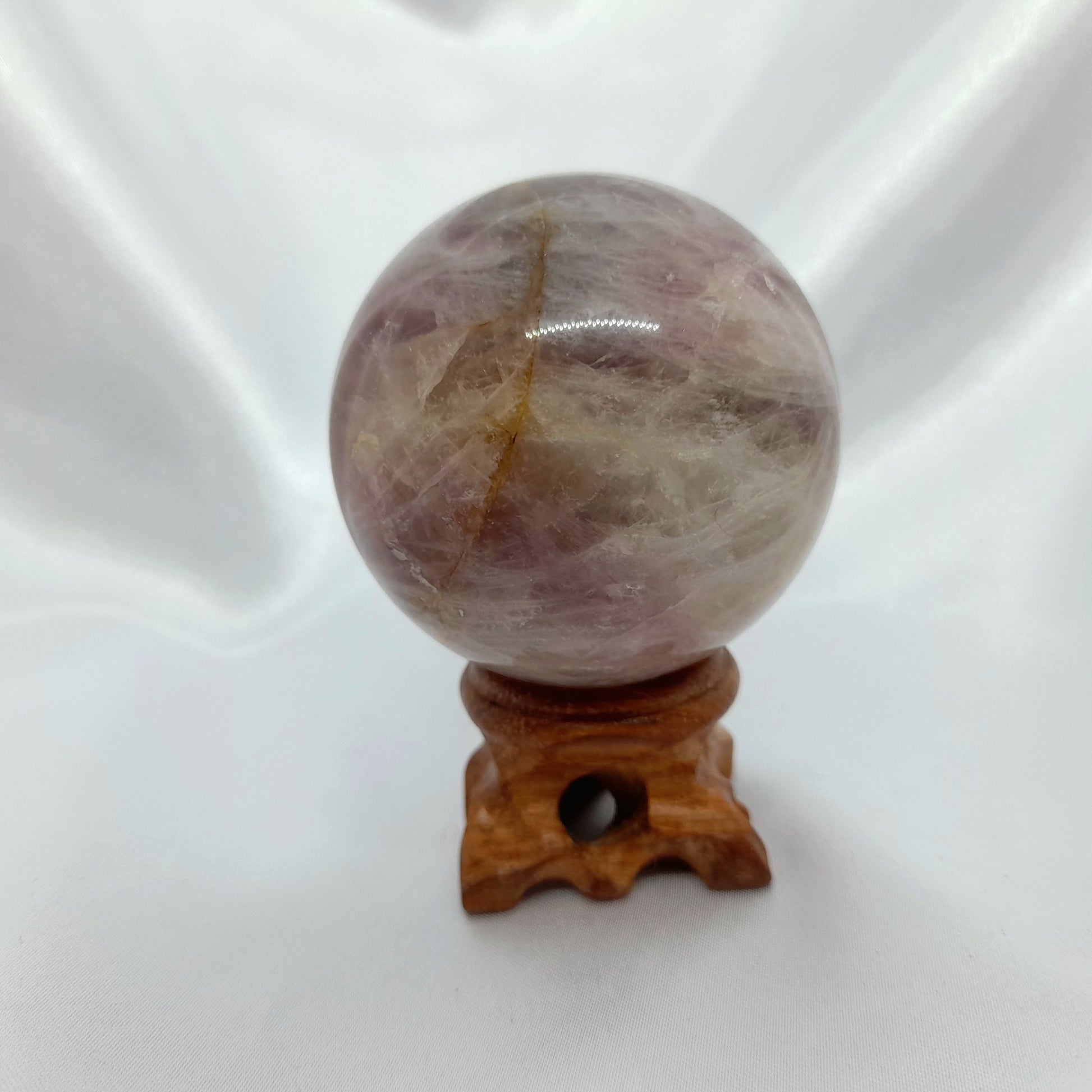Lavender Rose Quartz Sphere: A healing crystal and the stone of unconditional love. This captivating sphere, weighing roughly 260g and measuring approximately 6cm in diameter, radiates strong vibrations of love. Please note, spheres do not come with stands.