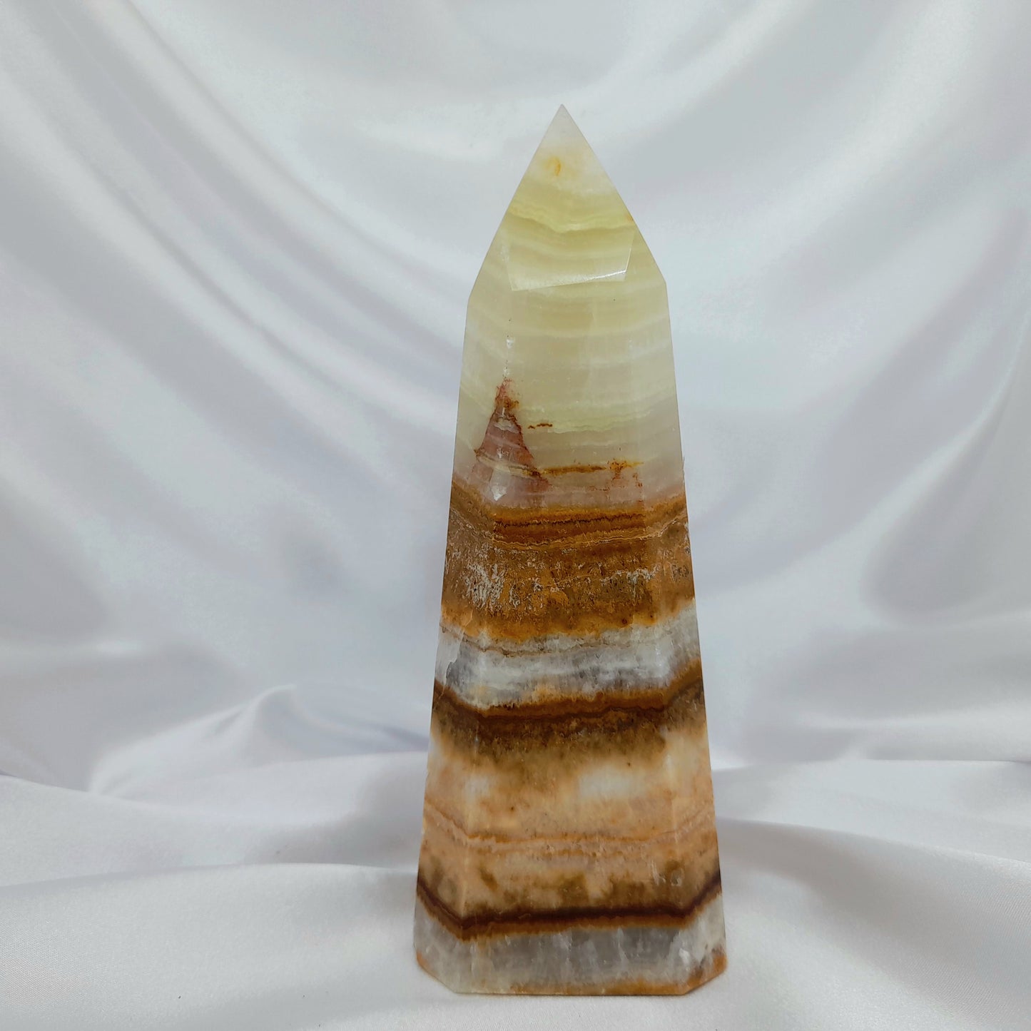 reen Banded Calcite Tower: A powerful crystal, also known as Green Onyx, fostering forgiveness and openness. 