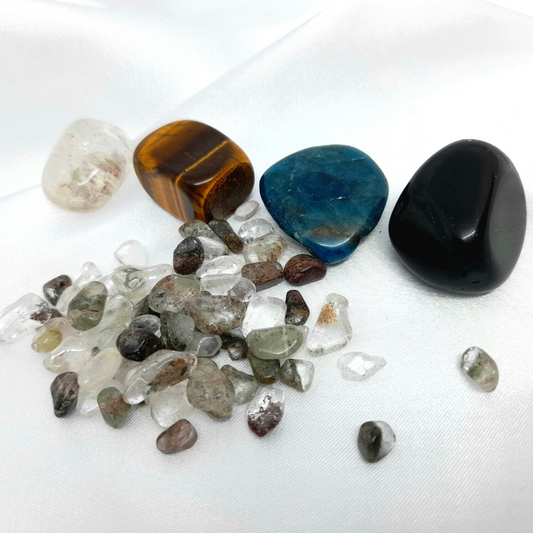 Higher Purpose and Inner Magic Bundle: Blue Apatite, Garden Quartz, Black Tourmaline, Yellow Tiger's Eye, and Clear Quartz crystals. Connect to your higher purpose, enhance psychic abilities, ensure grounding and protection, and amplify energies for self-discovery and magic.